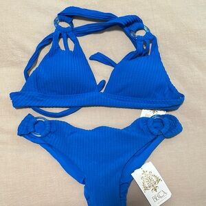 BECCA Vibrant Blue Bikini swimsuit Ring Accents sz Large Hipster Tie back NWT